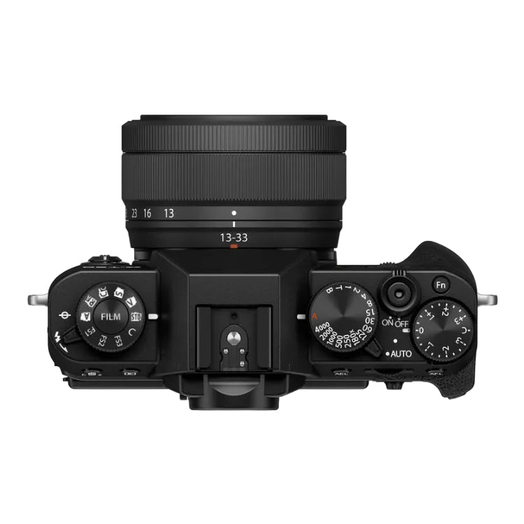 Top view of a black camera body with lens on a white background
