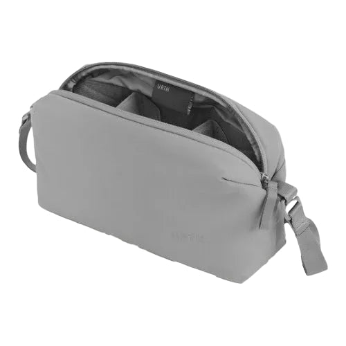 Gray travel bag with a zipper on a white background