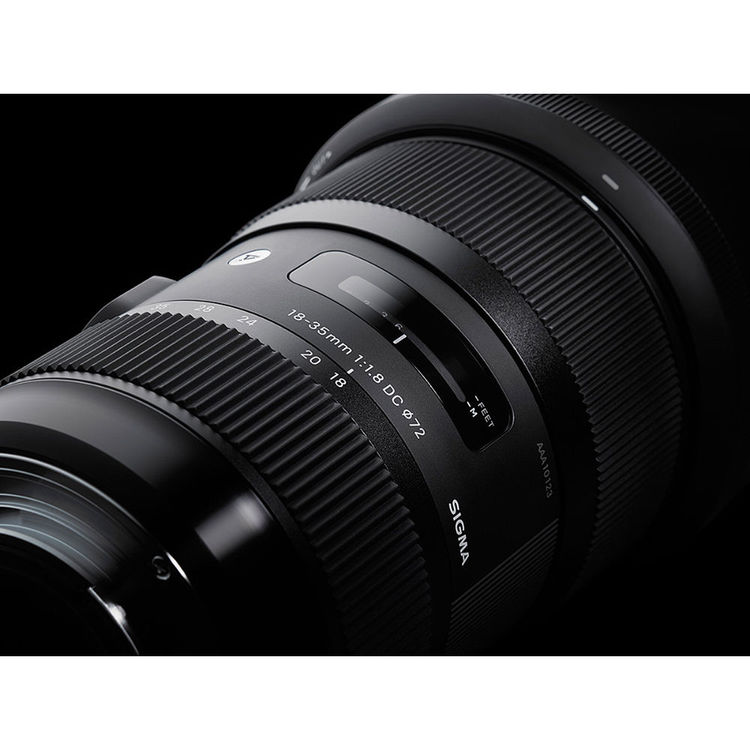 Sigma camera lens on a black background
