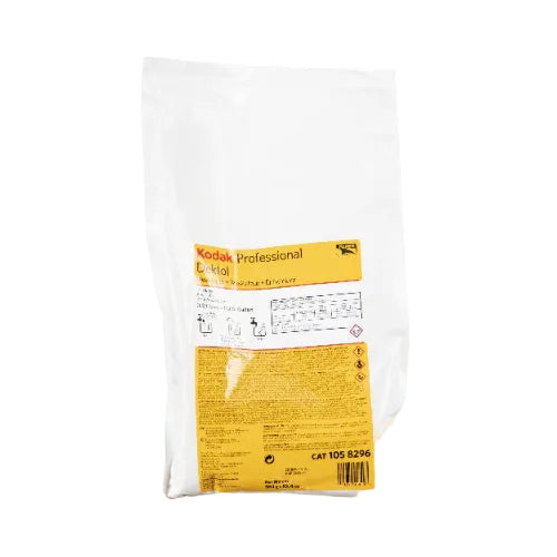 White plastic bag of Kodak Professional Dektol black-and-white paper developer powder, 1-gallon size with yellow label.