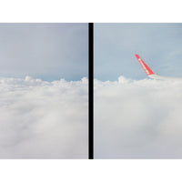Airplane flying above the clouds with plane logo
