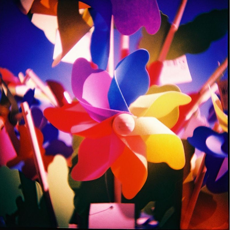 Colorful pinwheel toy with a blurred background