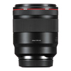 Camera lens with black and red design on a white background