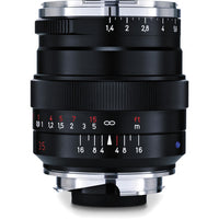 Camera lens with focus and aperture scale on a white background
