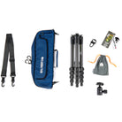 A set of camera accessories laid out on a white background, including a black shoulder strap, a blue carrying case with white 'RIVAL DROGUE 60' text, a folded black tripod, a black quick-release clamp, a small gray drawstring pouch, and a black ball head.