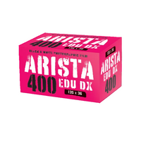 A bright pink box of Arista 400 Edu DX black and white photographic film, 135 x 36 size, shown at a three-quarter angle on a white background.