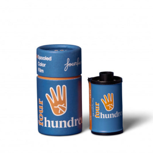 Two rolls of Four Hundred film packaging on a white background