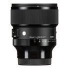 A Sigma 85mm f/1.4 DG DN φ77mm camera lens in matte black, shown from a front three-quarter angle against a solid white background.