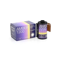 Amber T200 35mm color negative film roll and its purple and yellow gradient box with 27 exposures.