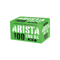 Bright green box of Arista EDU DX 100 ISO 35mm black and white film with 36 exposures.