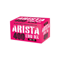 Bright pink box of Arista EDU DX 400 ISO 35mm black and white film with 36 exposures.