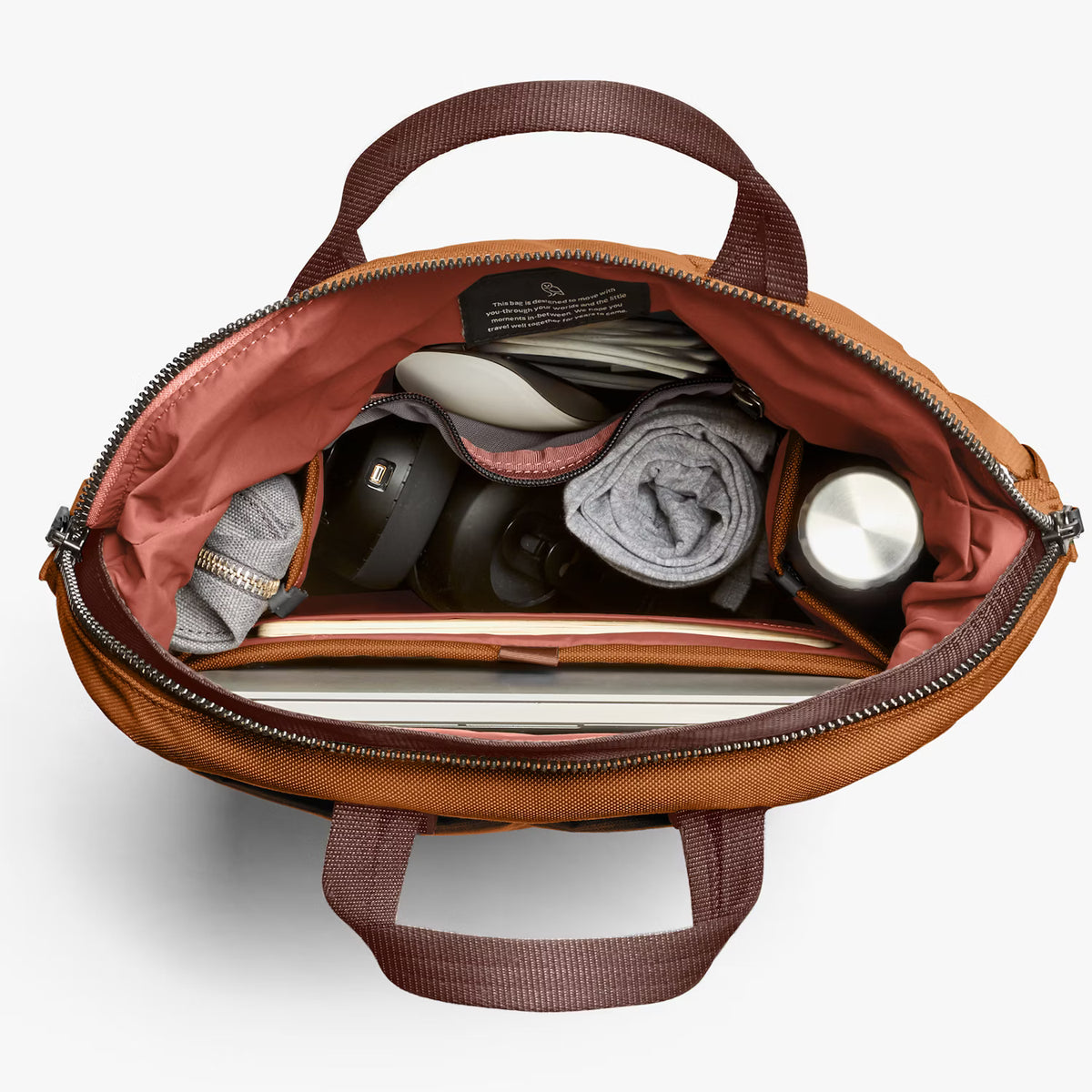 Inside of Bellroy Totepack bag with items on a white background