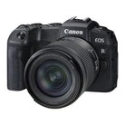 Canon EOS RP camera with lens on a white background
