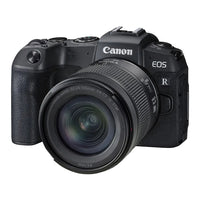 Canon EOS RP camera with lens on a white background
