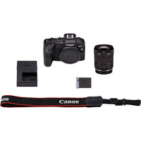 Canon camera with lens, battery, and strap on a white background