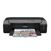 A Canon imagePROGRAF PRO-310 Professional 13-inch Wireless Inkjet Photo Printer with a printout coming out of the tray.