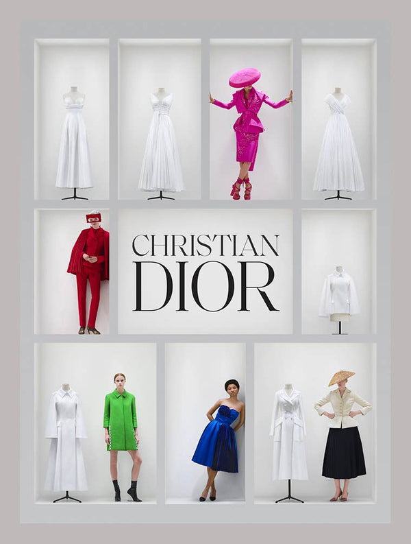 Display of Christian Dior fashion with mannequins wearing various outfits.
