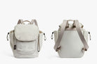 Two beige backpacks on a white background
