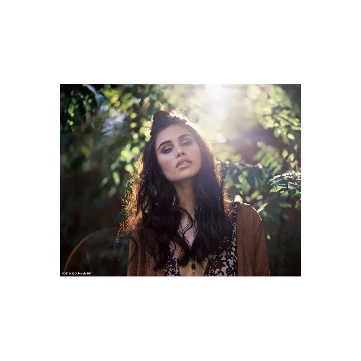 Portrait of a woman in sunlight, captured with CineStill 50Daylight 120 film, showcasing fine grain and natural colors.