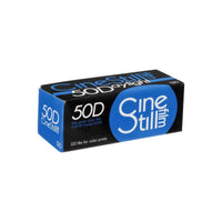 Single roll of CineStill 50Daylight 120 medium format color negative film in a black and blue branded box.