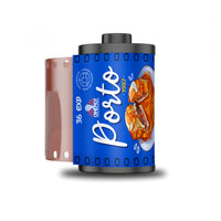 A roll of Porté 36 EXP film with a blue label featuring a retro ice cream graphic and white script logo, shown with a pink film strip partially unrolled on a white background.