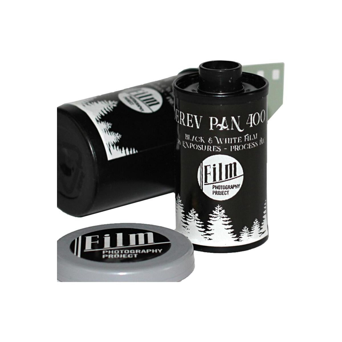 Two rolls of FPP Derev Pan 400 35mm black and white film with a grey plastic cap on a white background.