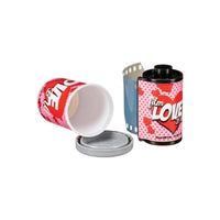 FPP Love 200 ISO 35mm black and white film roll with a pink heart-patterned canister and matching storage container.