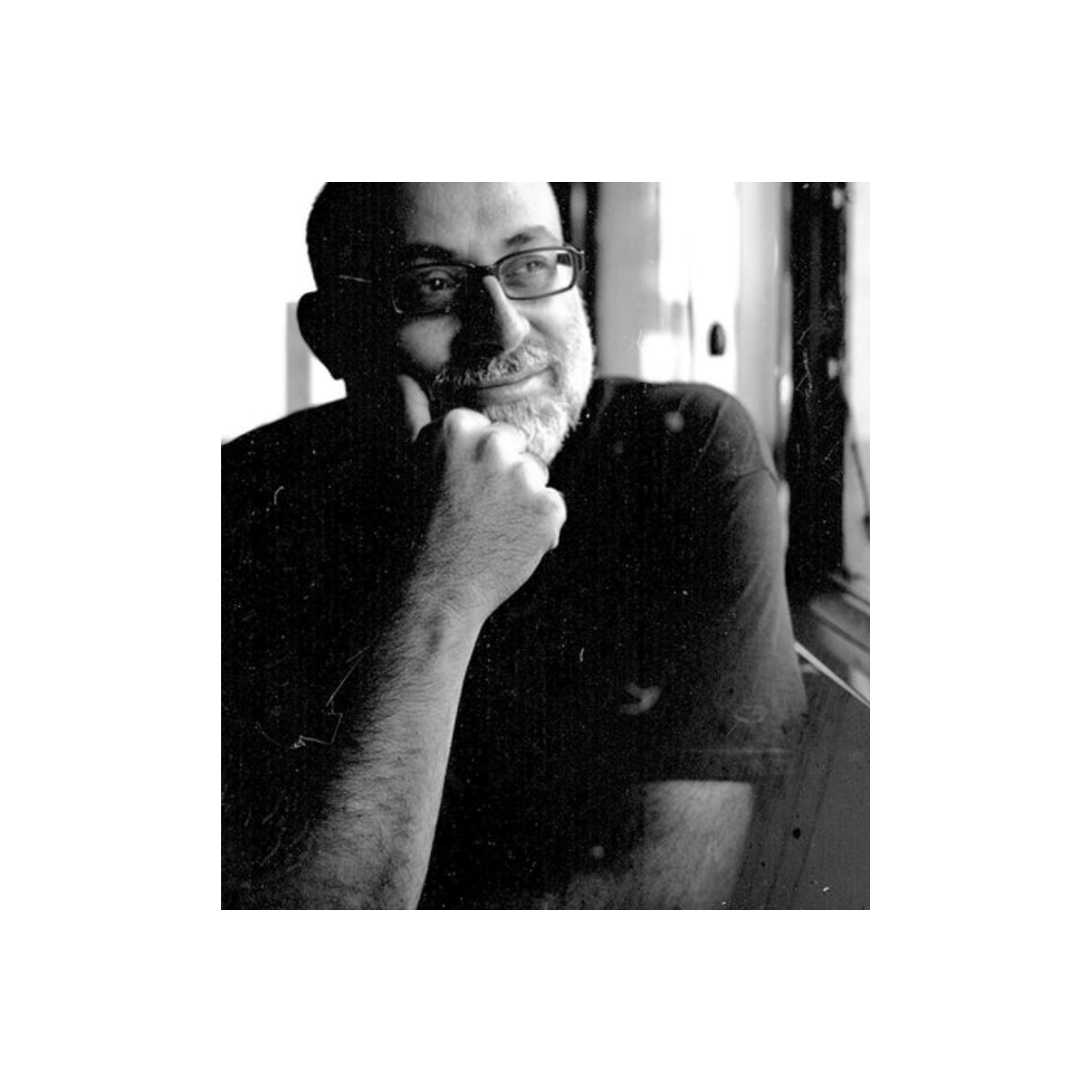 Black and white portrait of a man with glasses, showing fine grain and smooth tones from FPP Super Positive 0.8 film.