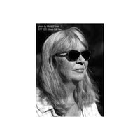 Black and white portrait of a woman with shoulder-length hair wearing dark sunglasses, with text in the upper left reading 'photo by Mark O'Brien' and 'FPP YETI 35mm BW Film'.