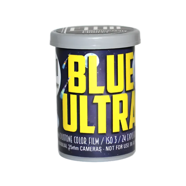 A canister of Blue Ultra II Color Film, featuring a dark navy blue label with bold yellow text and a gray lid, set against a plain white background.