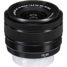 A black Fujifilm SuperEtc VC 15-45mm lens with white text markings, shown on a clean white background.