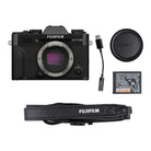 Fujifilm X-T30 camera body with battery, charger, and strap on a white background