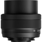 Black camera lens on a white background