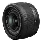 Black camera lens with Fujifilm branding on a white background