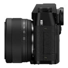 Black camera with lens on a white background