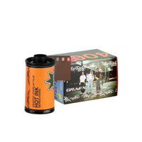 A roll of Grafx Hot Ink Series #5002 film with an orange label, shown next to its printed cardboard box on a light gray background.