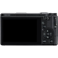 Back view of a Ricoh camera on a white background