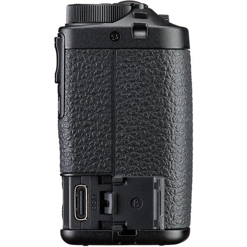 Black textured camera body on a white background
