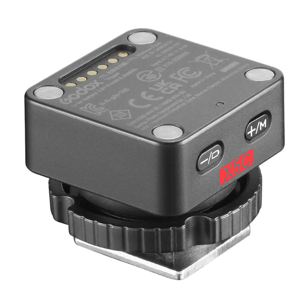 Camera wireless trigger with X50 branding on a white background