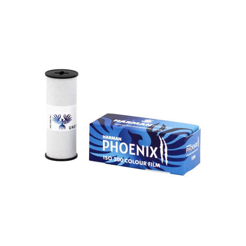 Harman Phoenix II 200 ISO 120 color film roll next to its blue and black patterned cardboard packaging box.