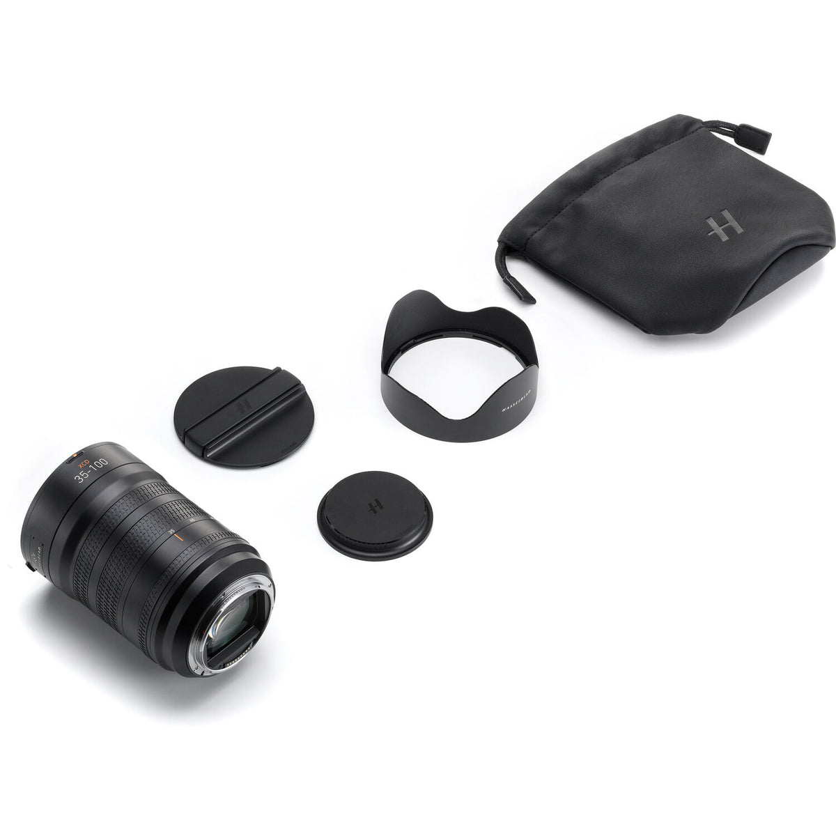 Camera lens with accessories on a white background