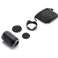 Camera lens with accessories on a white background