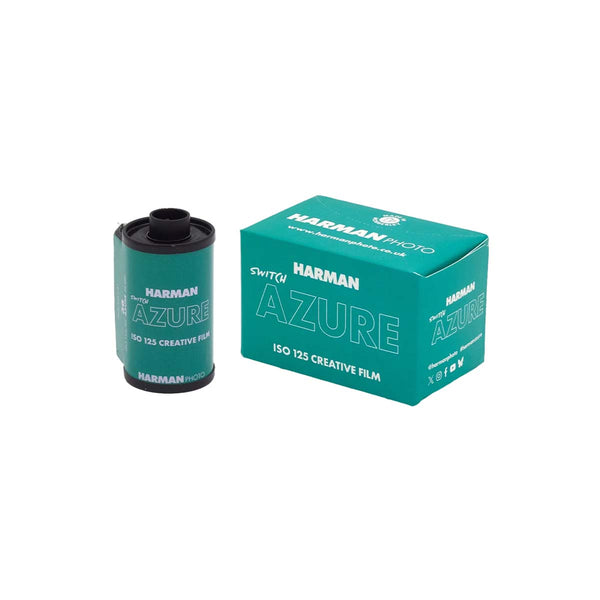 Harman Photo Switz Azure ISO 125 Creative Film shown as a teal film canister next to its matching teal packaging box on a white background.