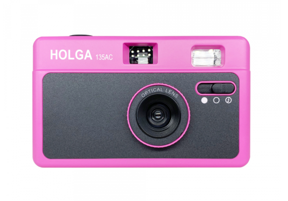 Bright pink Holga 135AC point-and-shoot film camera with a black front panel, optical lens, and built-in flash.