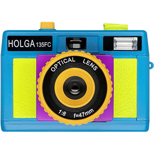 Holga 135FC toy camera in blue, yellow, and purple with a built-in flash and 47mm optical lens on a white background.
