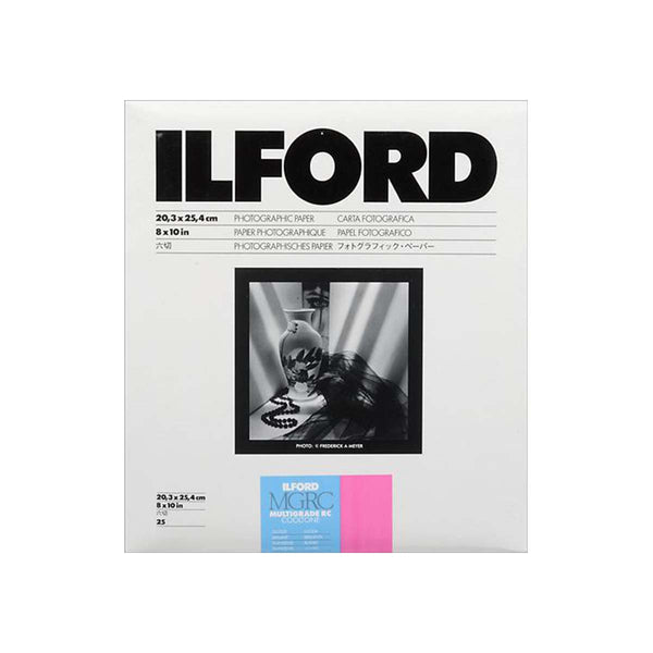 An Ilford Megapack photographic paper pack, size 24, featuring a white box with black text and a central black-and-white sample photo, on a clean white background.
