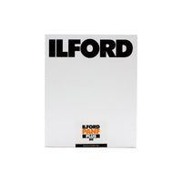 A white Ilford Panf Plus 50 Back and White film canister with bold black 'ILFORD' branding at the top and a smaller orange and black label near the bottom, shown on a plain white background.