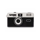 An Ilford Sprite 35-II disposable camera with a black and white color scheme, shown from the front against a plain white background.