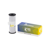 Kentmere PAN 200 ISO 120 black and white film roll next to its blue and yellow branded cardboard packaging.