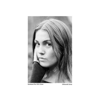 Black and white portrait of a woman captured on Kentmere Pan 200 35mm film, showcasing fine grain and sharp contrast.
